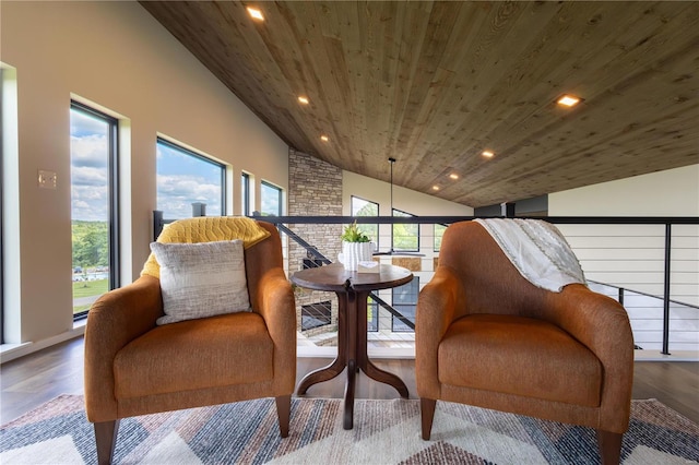 sitting room with wooden ceiling, vaulted ceiling, wood finished floors, and recessed lighting