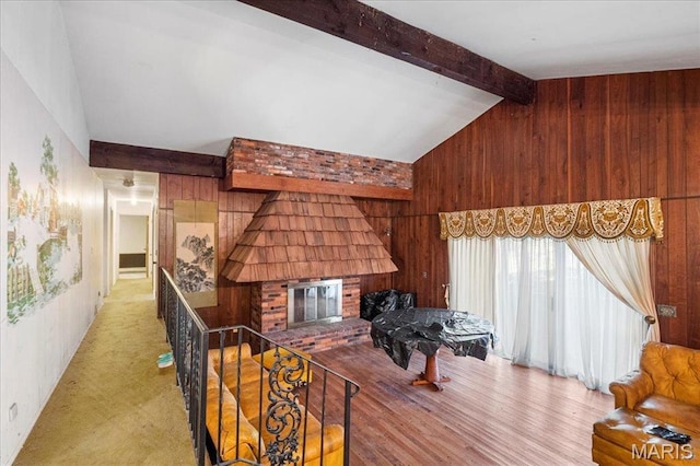 32 Briarcliffe Dr, Collinsville, IL 62234 - living room featuring wooden walls and a brick fireplace