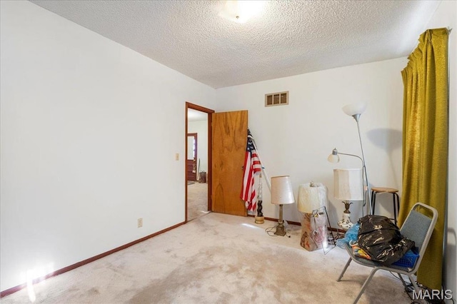 32 Briarcliffe Dr, Collinsville, IL 62234 - miscellaneous room featuring carpet and a textured ceiling