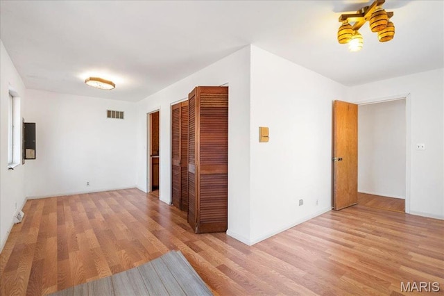32 Briarcliffe Dr, Collinsville, IL 62234 - spare room featuring light wood-style flooring and ceiling fan