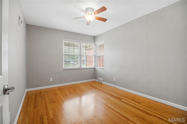 5816 Jamieson Ave, Saint Louis, MO 63109 - spare room with ceiling fan, light wood finished floors, and baseboards