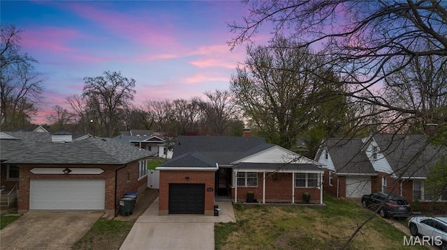 5816 Jamieson Ave, Saint Louis, MO 63109 - ranch-style house with driveway, an attached garage, and brick siding