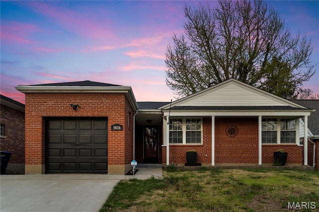5816 Jamieson Ave, Saint Louis, MO 63109 - ranch-style home with a garage, brick siding, concrete driveway, and a front yard