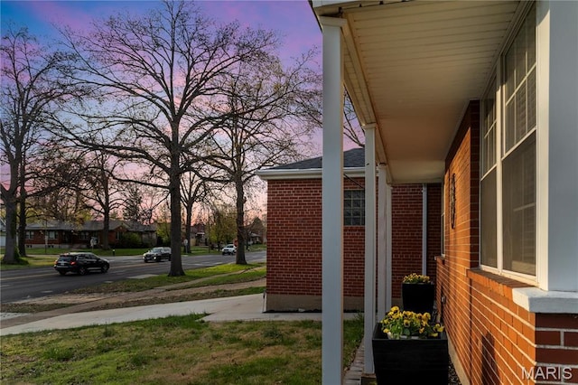 5816 Jamieson Ave, Saint Louis, MO 63109 - property exterior at dusk with brick siding