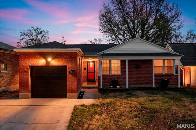 5816 Jamieson Ave, Saint Louis, MO 63109 - single story home featuring an attached garage, concrete driveway, brick siding, and a lawn