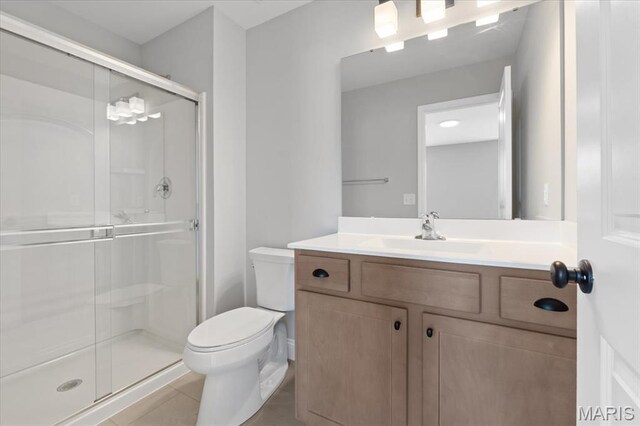 400 Thomlin Ct, Ofallon, MO 63367 - bathroom with vanity, a shower stall, and tile patterned floors