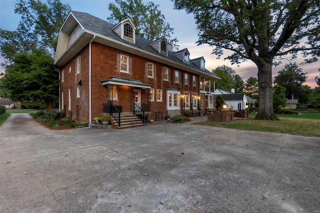 1011 N Ranney St, Sikeston, MO 63801 - view of front of home with brick siding and french doors