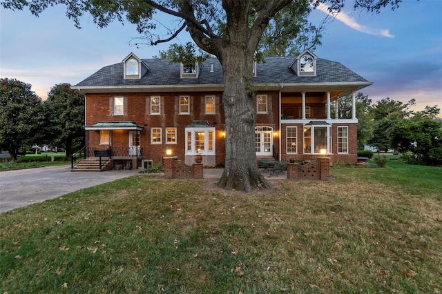 1011 N Ranney St, Sikeston, MO 63801 - view of front facade featuring brick siding and a front yard
