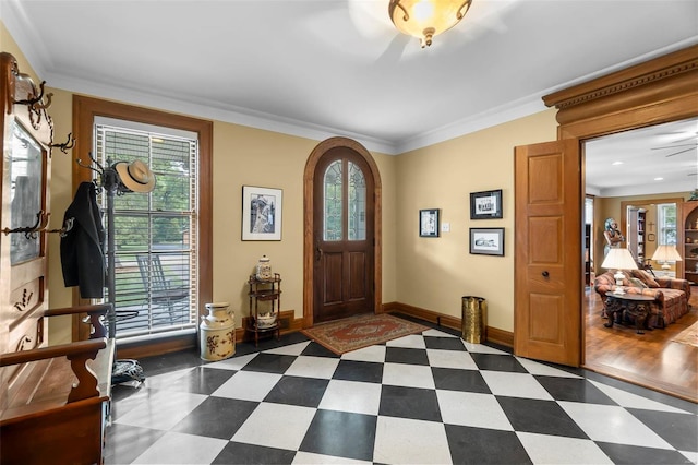 1011 N Ranney St, Sikeston, MO 63801 - entryway featuring dark flooring, baseboards, and crown molding