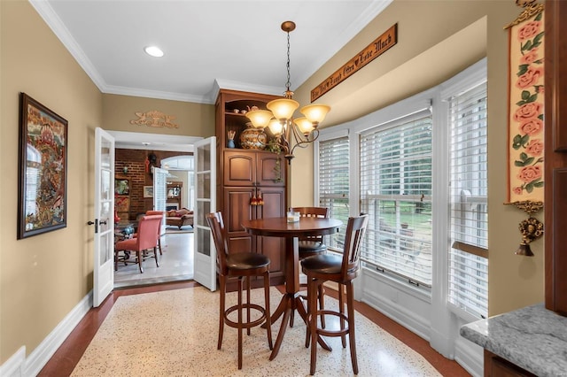 1011 N Ranney St, Sikeston, MO 63801 - dining room with ornamental molding, baseboards, a chandelier, and recessed lighting