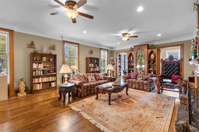 1011 N Ranney St, Sikeston, MO 63801 - living room with ceiling fan, recessed lighting, crown molding, wood finished floors, and healthy amount of natural light