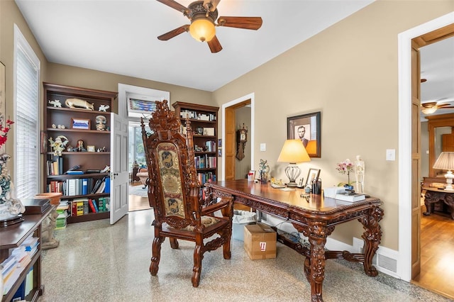 1011 N Ranney St, Sikeston, MO 63801 - home office featuring ceiling fan and baseboards
