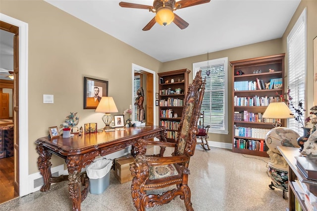 1011 N Ranney St, Sikeston, MO 63801 - office area featuring a ceiling fan and baseboards