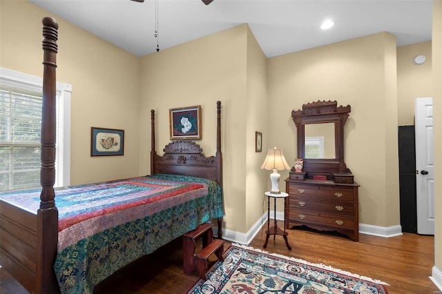 1011 N Ranney St, Sikeston, MO 63801 - bedroom with baseboards, wood finished floors, and ceiling fan