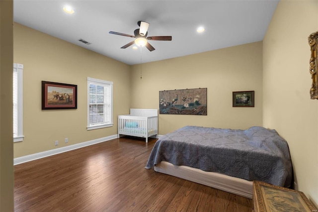 1011 N Ranney St, Sikeston, MO 63801 - bedroom featuring wood finished floors, baseboards, ceiling fan, and recessed lighting