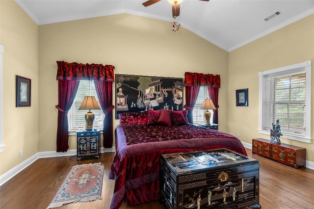 1011 N Ranney St, Sikeston, MO 63801 - bedroom with wood finished floors, crown molding, lofted ceiling, baseboards, and a ceiling fan