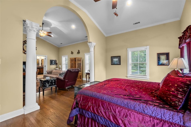 1011 N Ranney St, Sikeston, MO 63801 - bedroom featuring ornate columns, lofted ceiling, ornamental molding, arched walkways, and wood finished floors