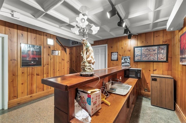 1011 N Ranney St, Sikeston, MO 63801 - office space with wooden walls, baseboards, coffered ceiling, and beam ceiling