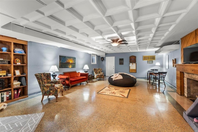1011 N Ranney St, Sikeston, MO 63801 - living area featuring speckle patterned floor, ceiling fan, a fireplace, and baseboards