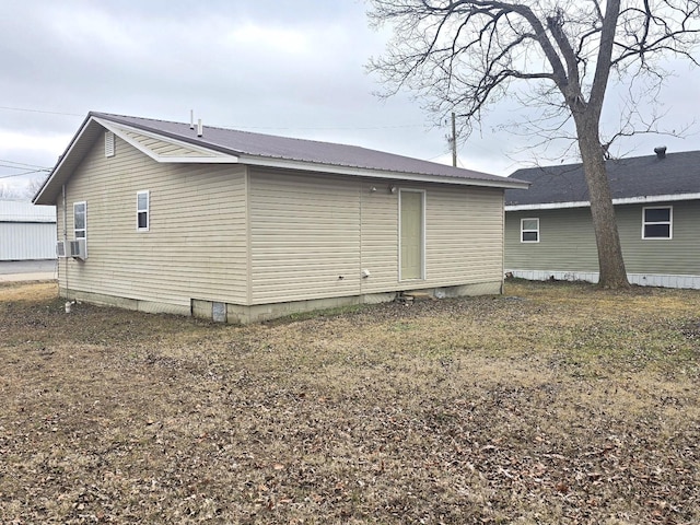 513 N E St, Poplar Bluff, MO 63901 - view of side of home featuring metal roof