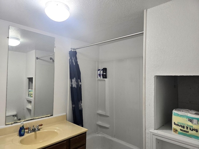 513 N E St, Poplar Bluff, MO 63901 - full bath featuring shower / bathtub combination with curtain, a textured ceiling, and vanity