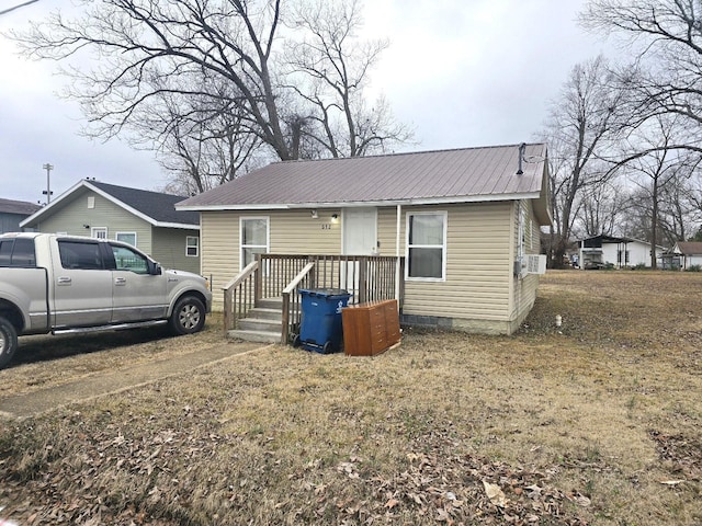 513 N E St, Poplar Bluff, MO 63901 - view of front of house with metal roof