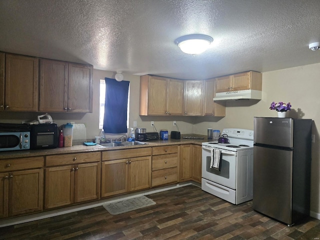 513 N E St, Poplar Bluff, MO 63901 - kitchen featuring white electric range, freestanding refrigerator, under cabinet range hood, a textured ceiling, and a sink