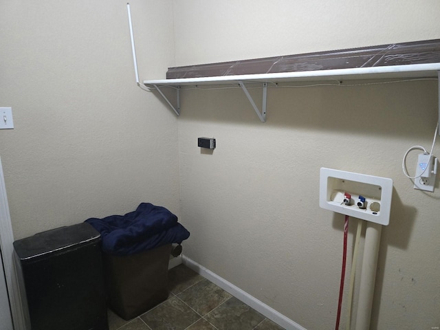 513 N E St, Poplar Bluff, MO 63901 - washroom with baseboards, hookup for a washing machine, and dark tile patterned flooring