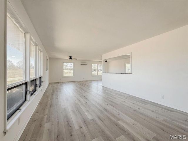 801 S Grant S, Desloge, MO 63601 - unfurnished living room featuring light wood-style floors, baseboards, and a ceiling fan