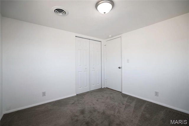 801 S Grant S, Desloge, MO 63601 - unfurnished bedroom featuring carpet flooring, baseboards, and a closet