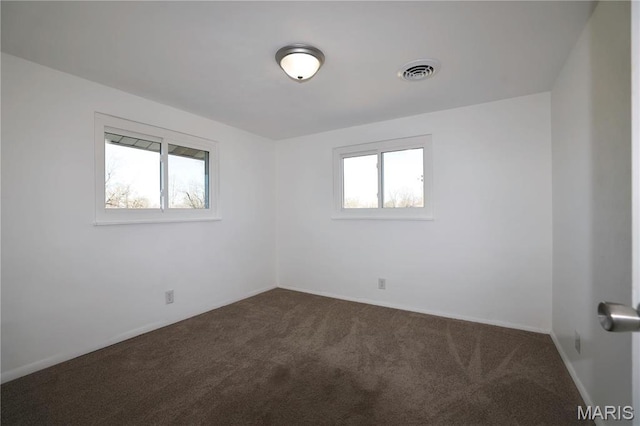 801 S Grant S, Desloge, MO 63601 - empty room with dark carpet and baseboards