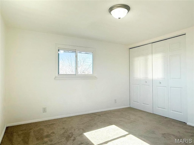801 S Grant S, Desloge, MO 63601 - unfurnished bedroom featuring carpet, baseboards, and a closet