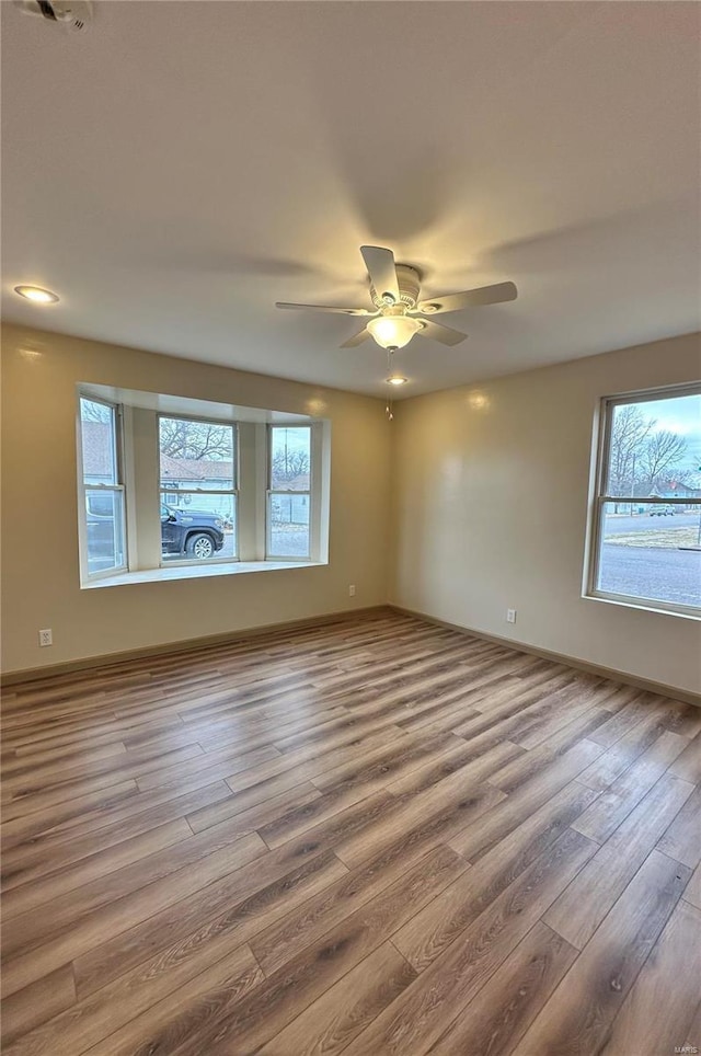 117 Pine St, Sullivan, MO 63080 - empty room with wood finished floors and ceiling fan