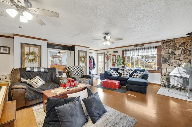 524 N St, Farmington, MO 63640 - living room with ceiling fan, a textured ceiling, crown molding, and wood finished floors