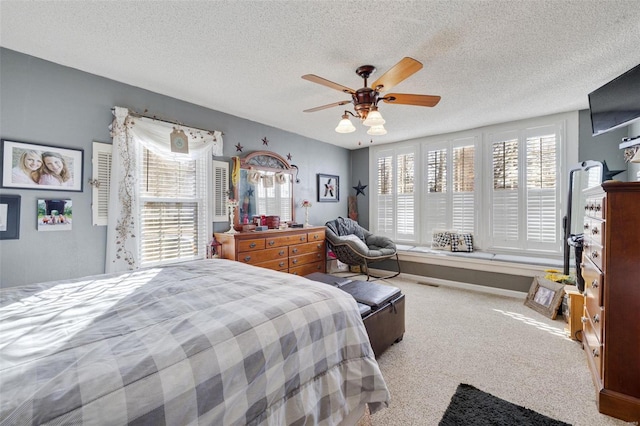 524 N St, Farmington, MO 63640 - carpeted bedroom with a textured ceiling and a ceiling fan
