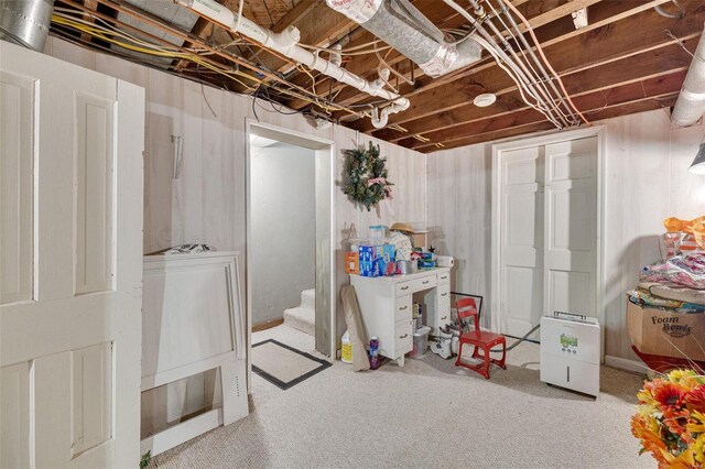 524 N St, Farmington, MO 63640 - unfinished below grade area with stairway and carpet floors