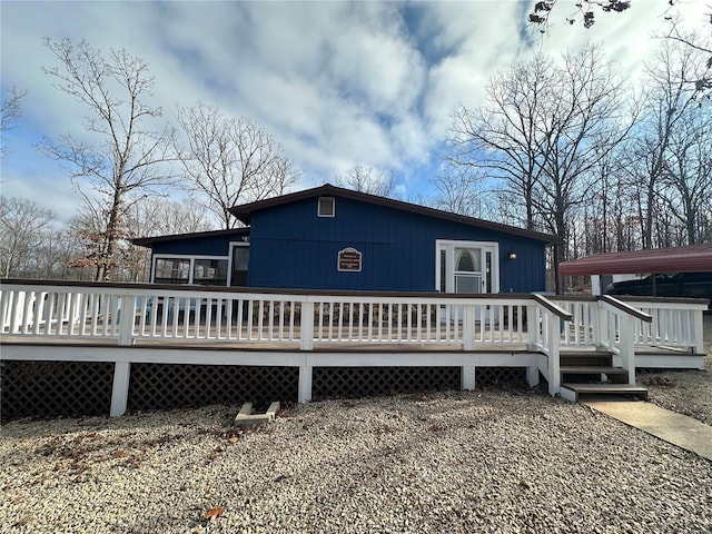 back of property with a deck