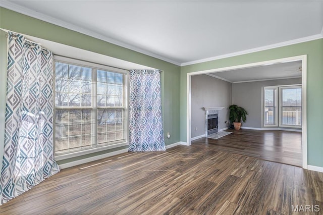 4645 Quail Run Rd, Farmington, MO 63640 - unfurnished living room with wood finished floors, baseboards, crown molding, and a fireplace with flush hearth