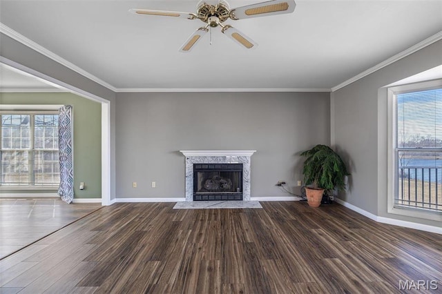 4645 Quail Run Rd, Farmington, MO 63640 - unfurnished living room with wood finished floors, ceiling fan, a high end fireplace, baseboards, and crown molding
