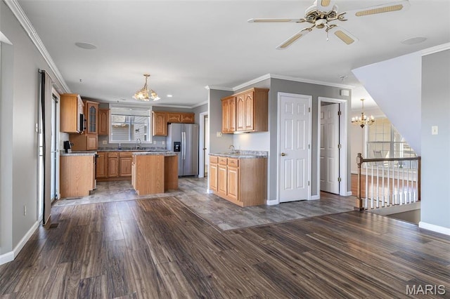 4645 Quail Run Rd, Farmington, MO 63640 - kitchen featuring a chandelier, stainless steel fridge with ice dispenser, dark wood-style flooring, a kitchen island, and ornamental molding