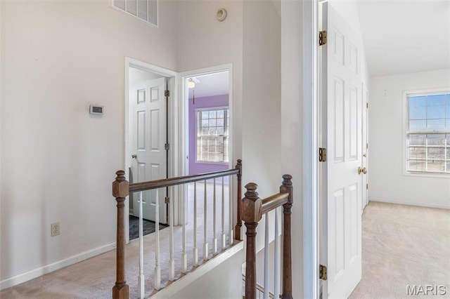 4645 Quail Run Rd, Farmington, MO 63640 - hall featuring an upstairs landing, carpet floors, and baseboards