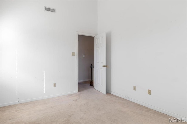 4645 Quail Run Rd, Farmington, MO 63640 - empty room featuring light colored carpet and baseboards