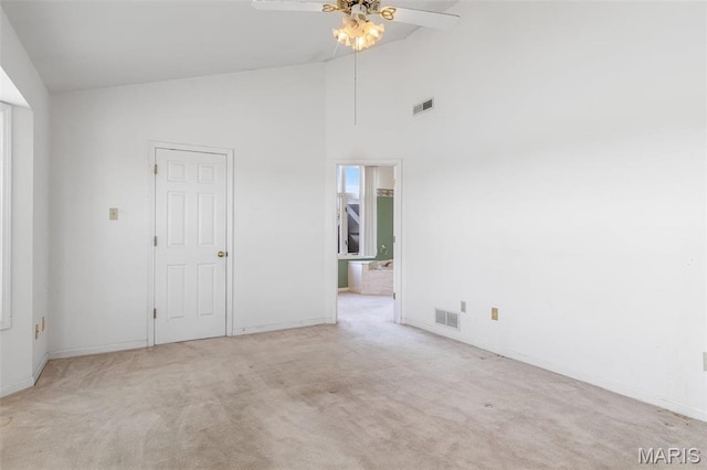 4645 Quail Run Rd, Farmington, MO 63640 - carpeted spare room with a ceiling fan, baseboards, and high vaulted ceiling