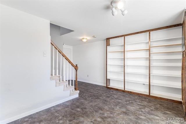 4645 Quail Run Rd, Farmington, MO 63640 - unfurnished room with stairway and baseboards