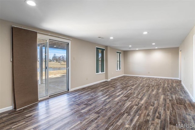 4645 Quail Run Rd, Farmington, MO 63640 - unfurnished room featuring dark wood-type flooring, baseboards, and recessed lighting