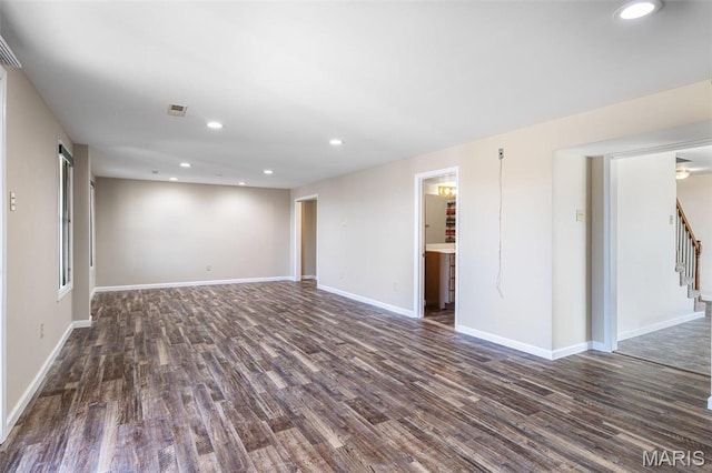 4645 Quail Run Rd, Farmington, MO 63640 - unfurnished living room featuring wood finished floors, stairs, recessed lighting, and baseboards