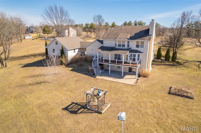 4645 Quail Run Rd, Farmington, MO 63640 - back of house featuring stairs, a deck, a chimney, a patio, and a yard