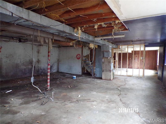 6045 Ozark Dr, High Ridge, MO 63049 - unfinished basement featuring stairs