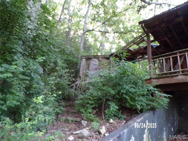 6045 Ozark Dr, High Ridge, MO 63049 - view of side of property with a deck
