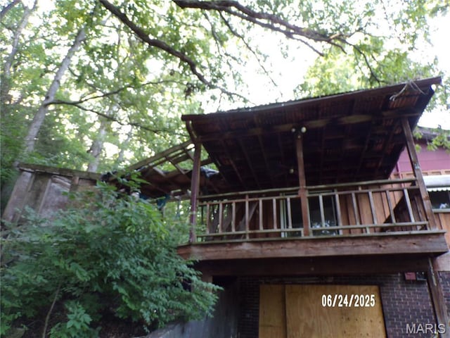 6045 Ozark Dr, High Ridge, MO 63049 - back of house featuring brick siding and a deck